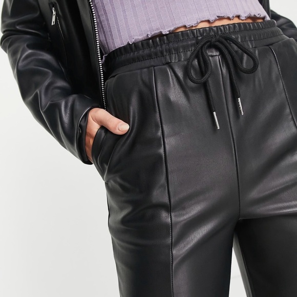 ASOS DESIGN Tall faux leather peg pant in black   US 4 Tall - Picture 9 of 10